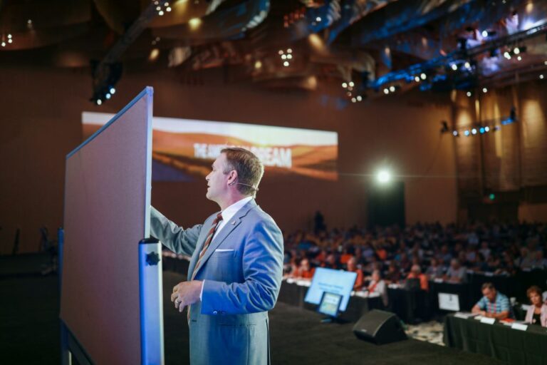 American-Dream-Experience-Mark-Matson-Working-At-Whiteboard-On-Stage